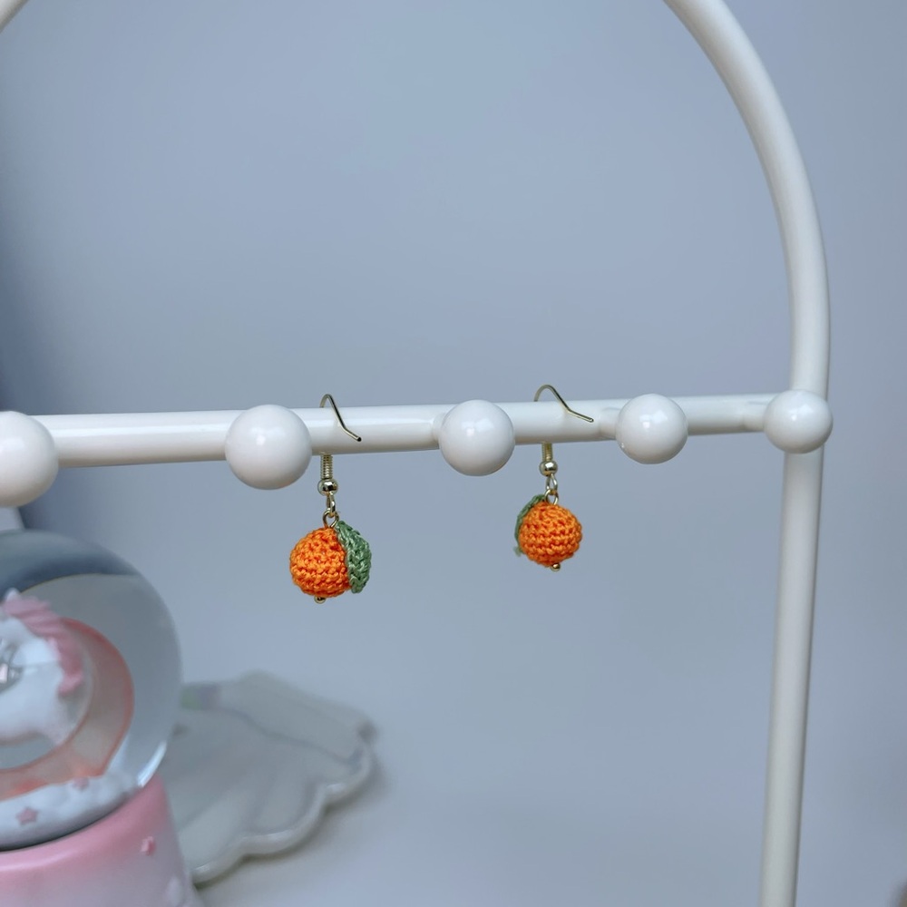 Handmade micro-crocheted orange dangle earrings